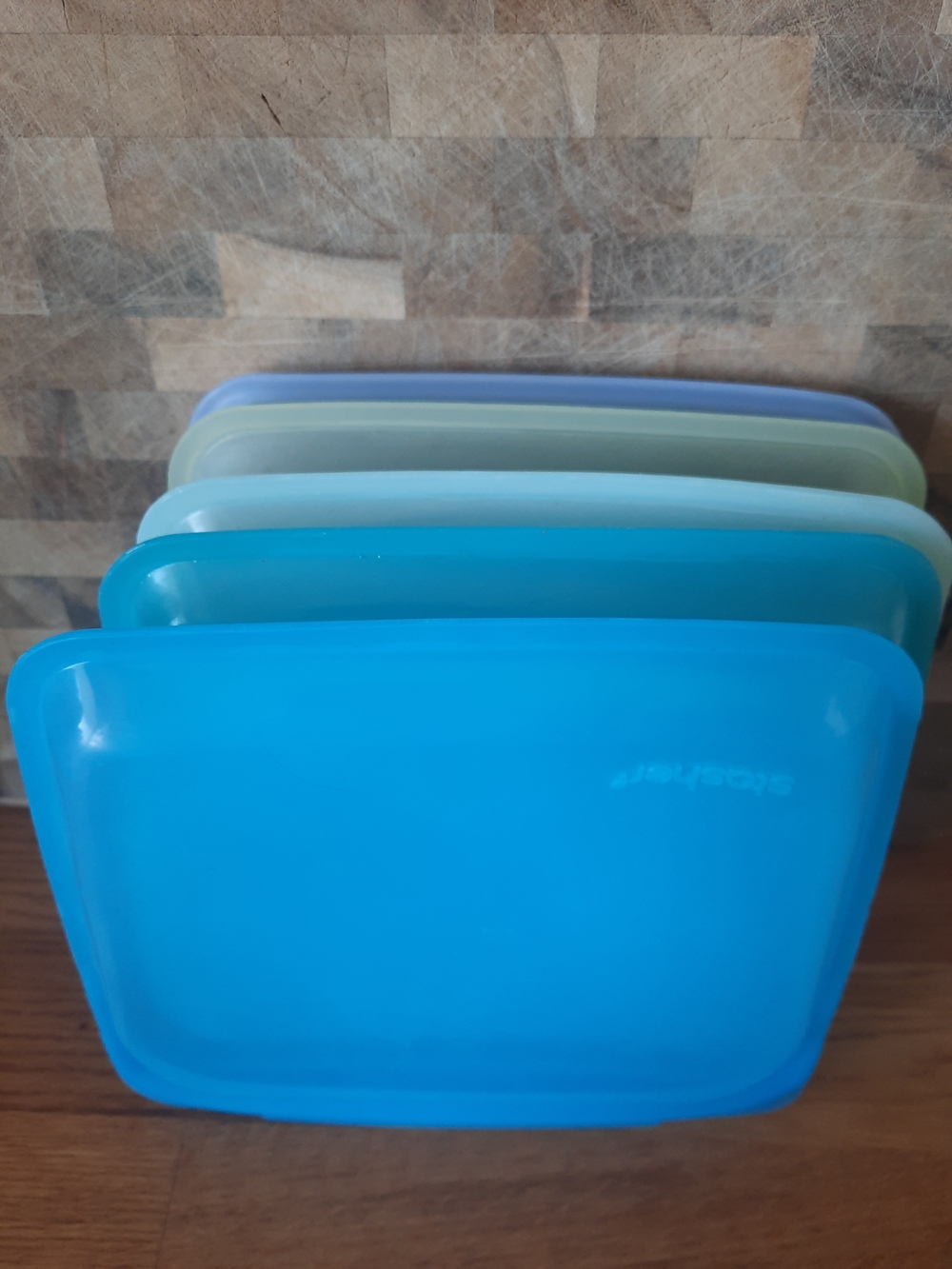 5 stasher reusable silicone food storage bags in a variety of Blue, Green Purple